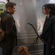 Clint and Kate talk outside of the subway.